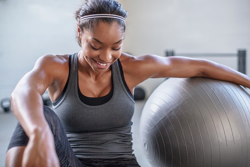 Lady with exercise ball.