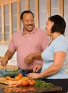 couple in the kitchen preparing meal