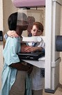 african american woman getting a mammogram