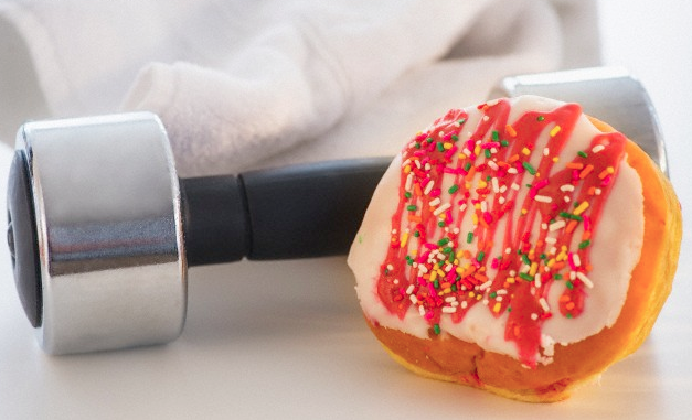 A weight, a towel and doughnut