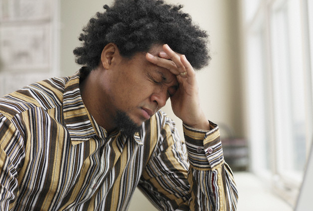 A man with a tension headache