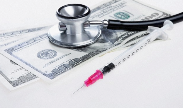 Dollar bills, a stethoscope and a needle