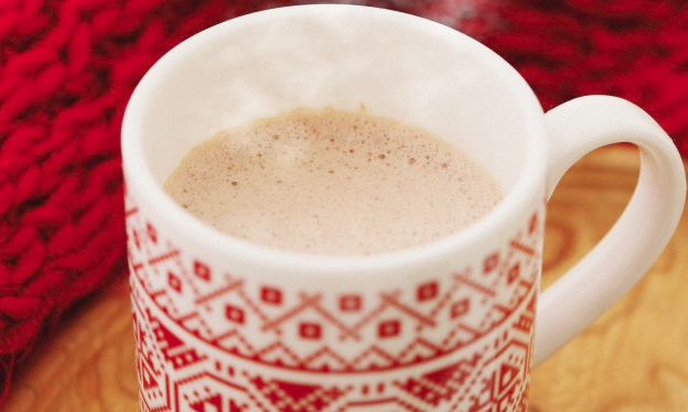 A red mug of hot chocolate