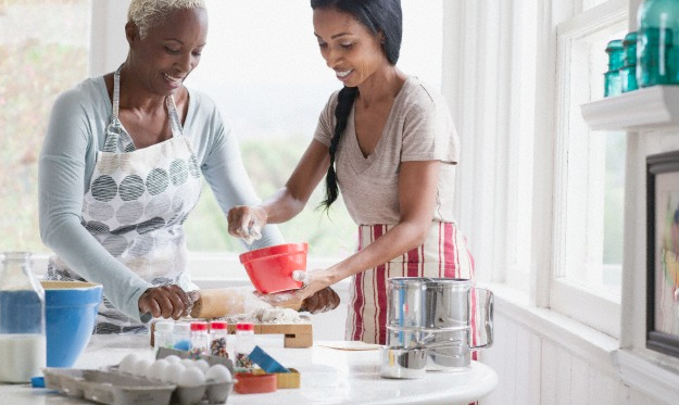 Two women cooking in their kitchen