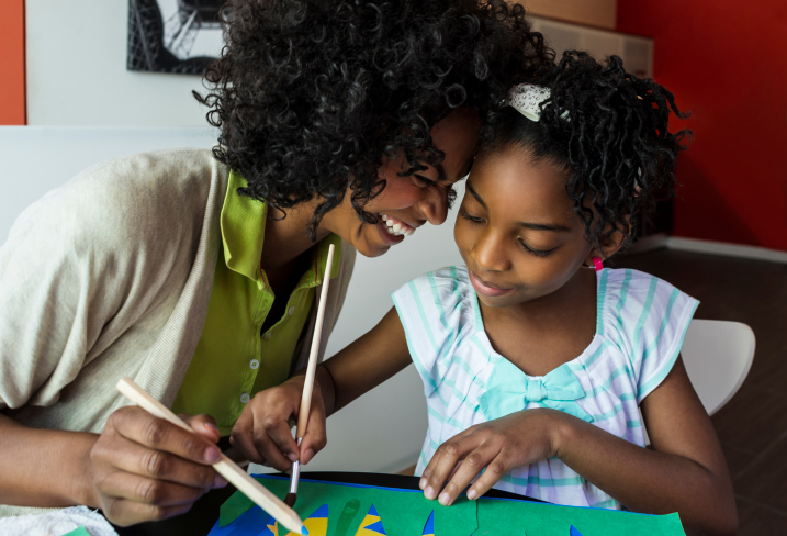Mother and daughter doing arts and crafts