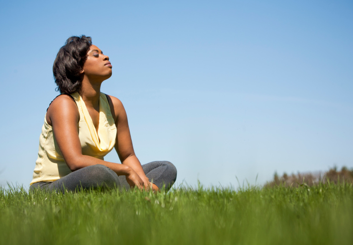 woman sitting outside sun