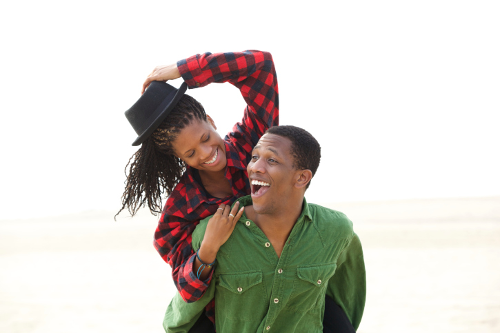 couple outdoors happy