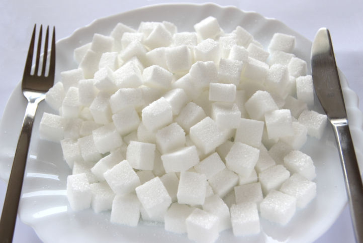 Sugar cubes on plate