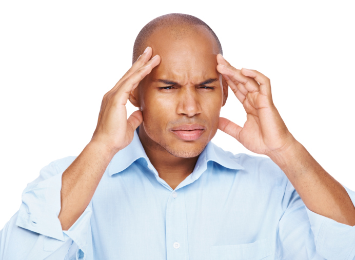man stressed holding head