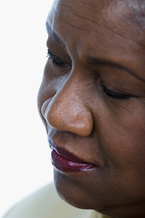 close up of older woman thinking