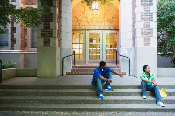couple arguing on steps