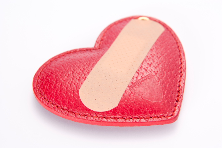 band aid covering heart