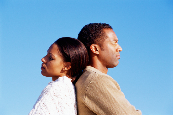 couple with back to each other