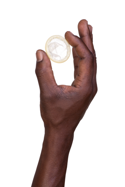 hand holding condom