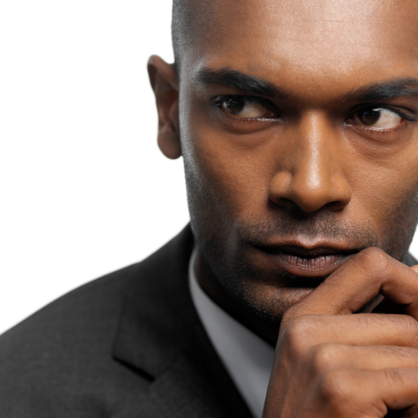 Close-up of a young businessman looking sideways