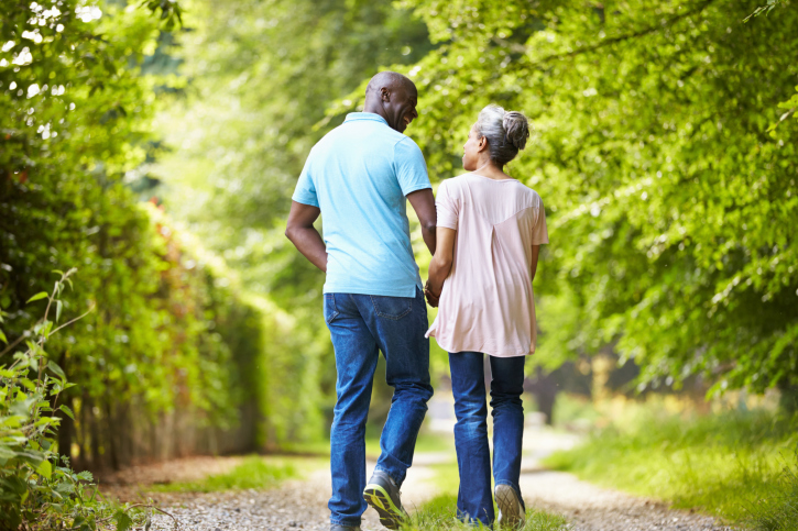 older couple walking and talking