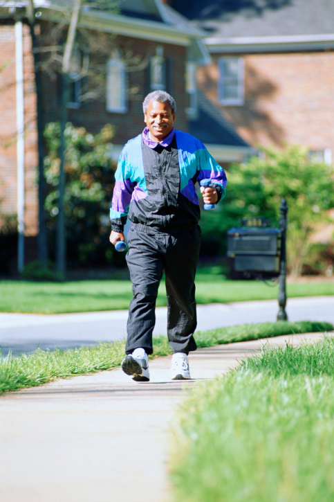 older man walking outside