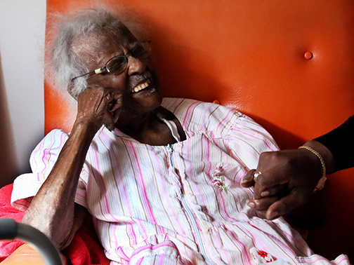Michael Kinloch, 54, of Canton visits with Jeralean Talley, 113, in the living room of her home in Inkster, Mich. on Tuesday, April 2, 2013. Kinloch's son, Tyler, is Talley's godson. Kimberly P. Mitchell/Detroit Free Press (Via OlyDrop)