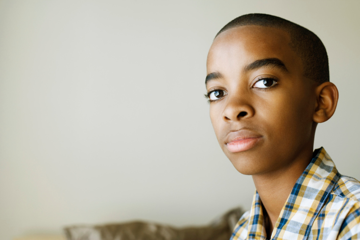 young man looking into the camera