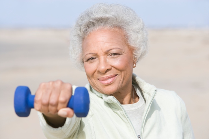 senior woman with dumbbell