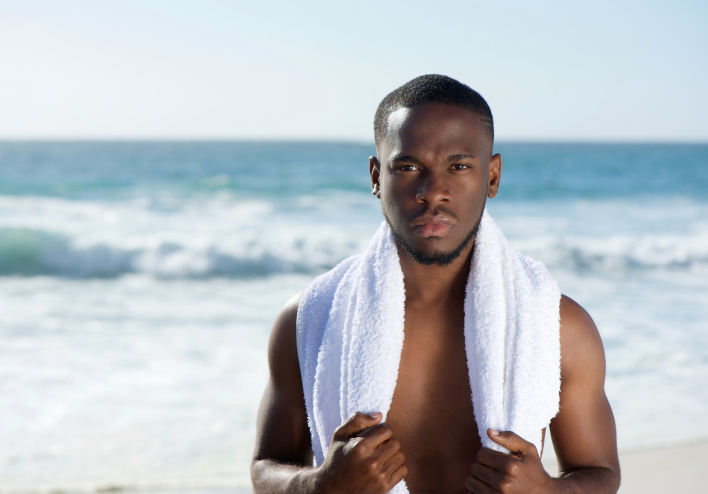 man standing on beach