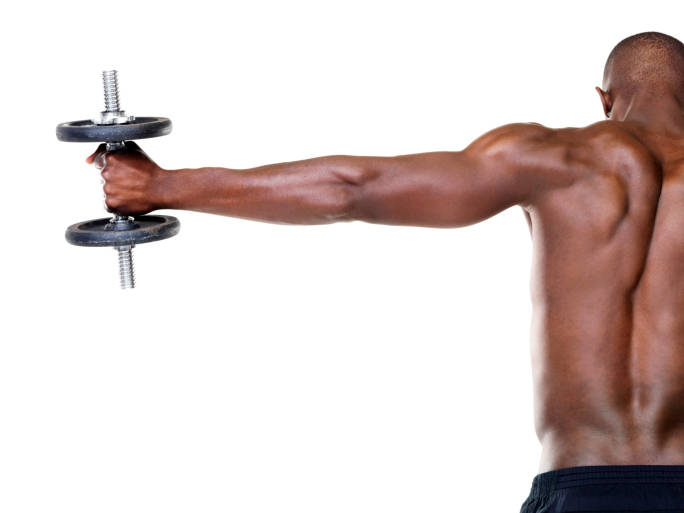 man holding dumbbell in hand
