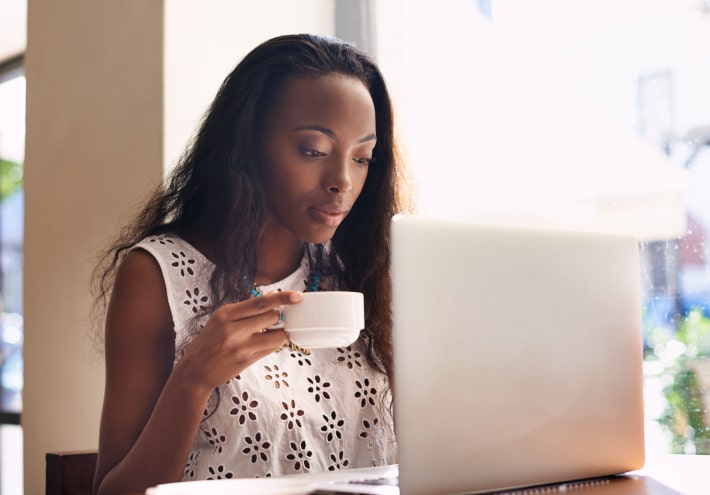woman sipping on tea