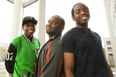 Julius and Desmond Means were cured of sickle cell disease at UI Health through a chemotherapy-free stem cell transplant in 2013. Their older brother, Clifford (center), was the donor. Photo: UIC News Release