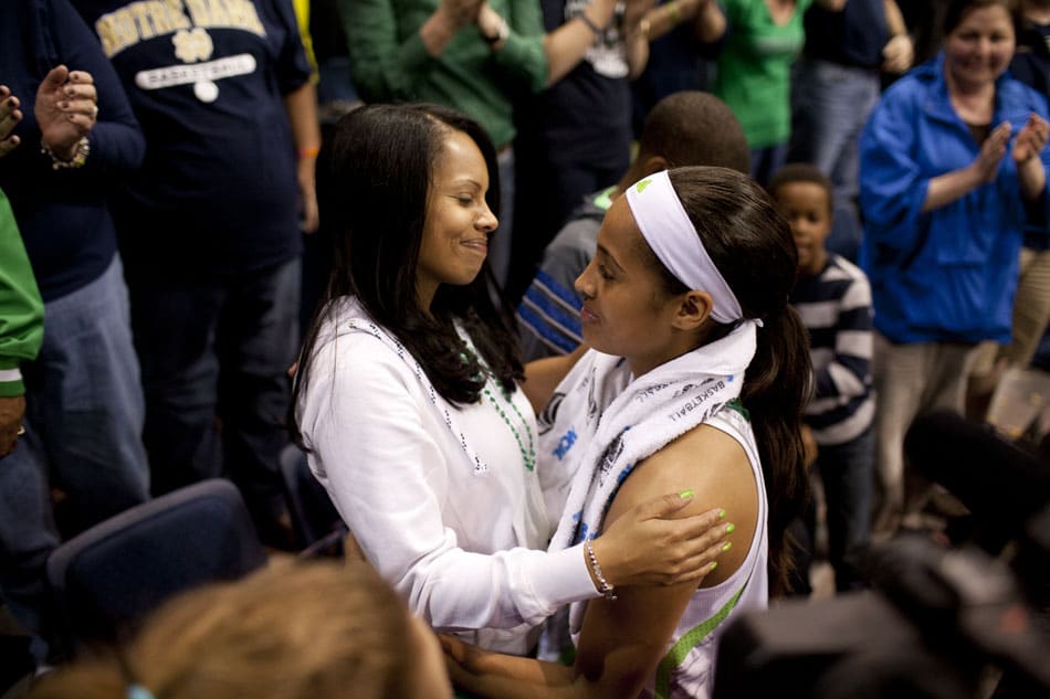 South Bend Tribune/JAMES BROSHER Notre Dame guard Skylar Diggins, right, shares a hug with her mother, Renee Scott, after a 93-63 win against Kansas in the women's NCAA college basketball tournament on Sunday, March 31, 2013, in Norfolk, Va. Diggins scored 27 points in the win and became Notre Dame's all-time scoring leader.