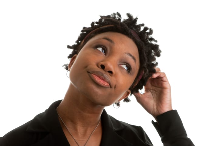 African American woman thinking