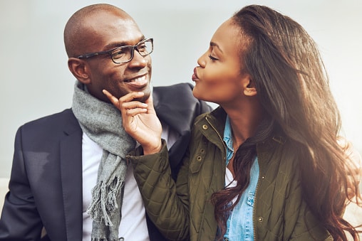 man and woman date flirting