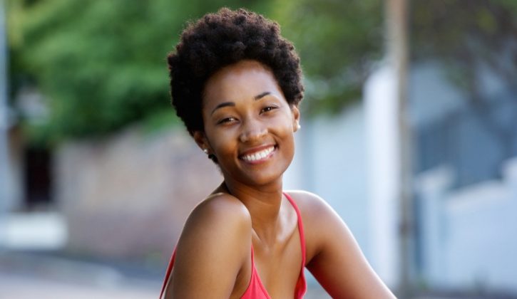 African American young woman happy outside