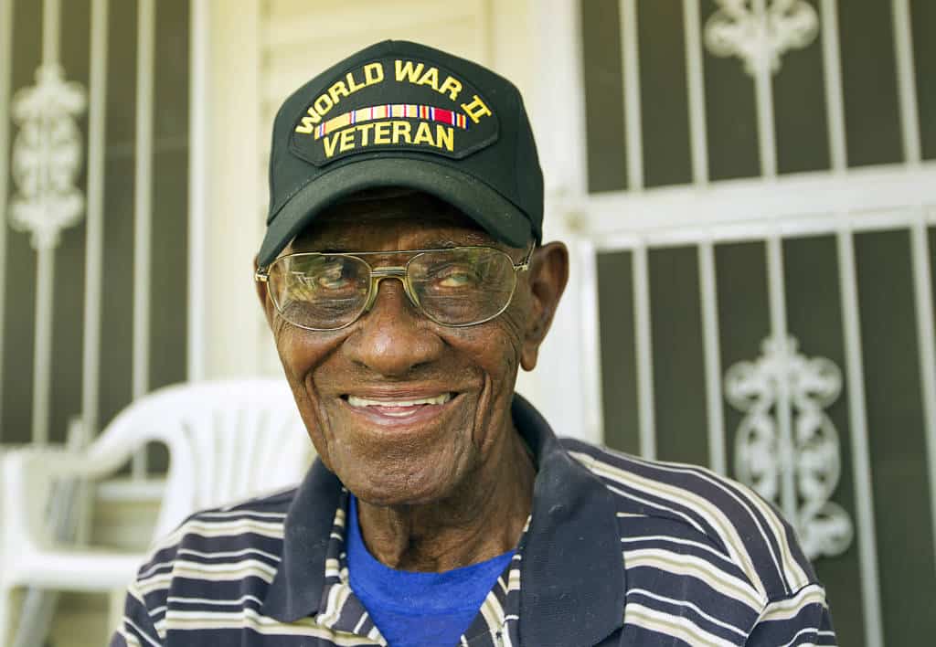 Richard Overton celebrated his 107th birthday last week and will continue the celebration with a trip to Washington D.C. this weekend as part of the Honor Flight, a collection of World War II Veterans, who are recognized each year for their contribution to America. Overton lives in a small frame house in East Austin and often sits on his porch. RALPH BARRERA / AMERICAN-STATESMAN