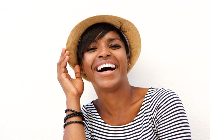 Happy African American woman wearing hat
