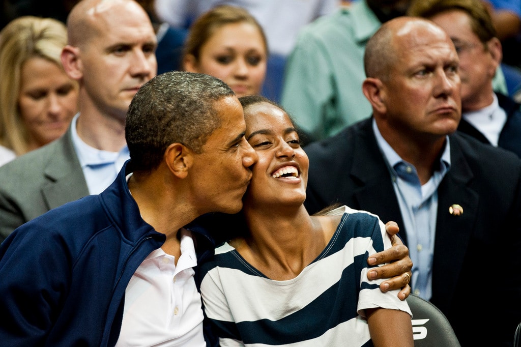 Michelle, Barack, and Malia Obama take in an exhibition game between the United States national basketball team and the Brazilian national basketball team at Verizon Center, Washington D.C., Monday, July 16, 2012. (Ryan M.L. Young/The Washington Times)