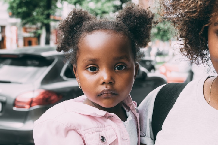 African American baby toddler girl unhappy