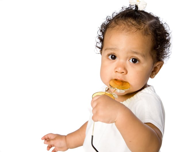 Baby teething with toy