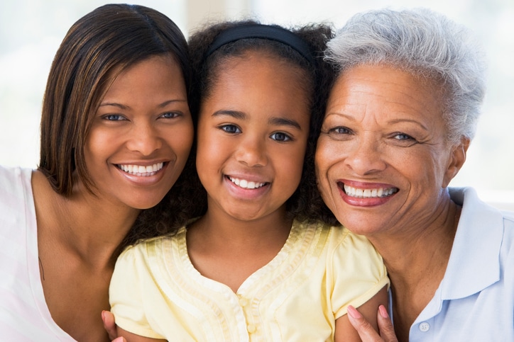 African American mother daughter grandmother smiling