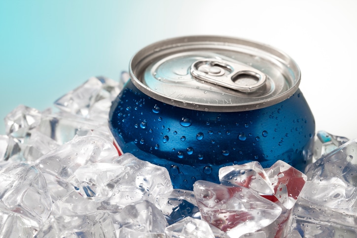 can of soda on ice