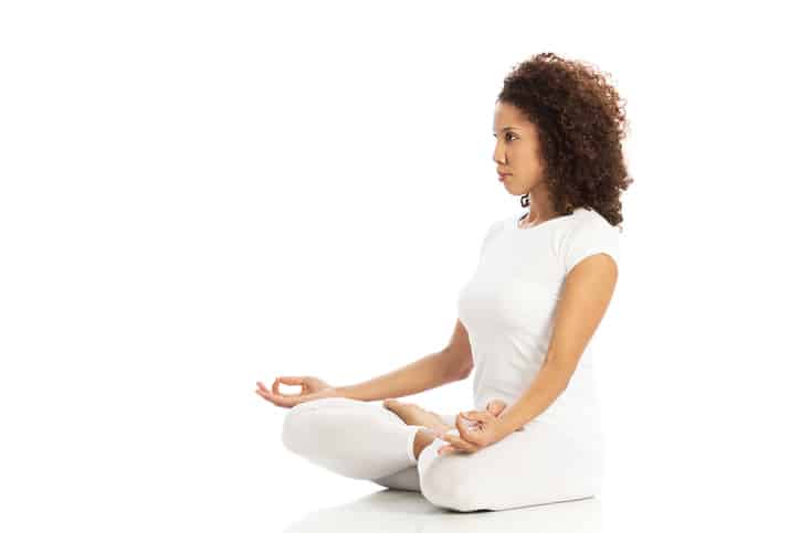 woman in yoga cross leg