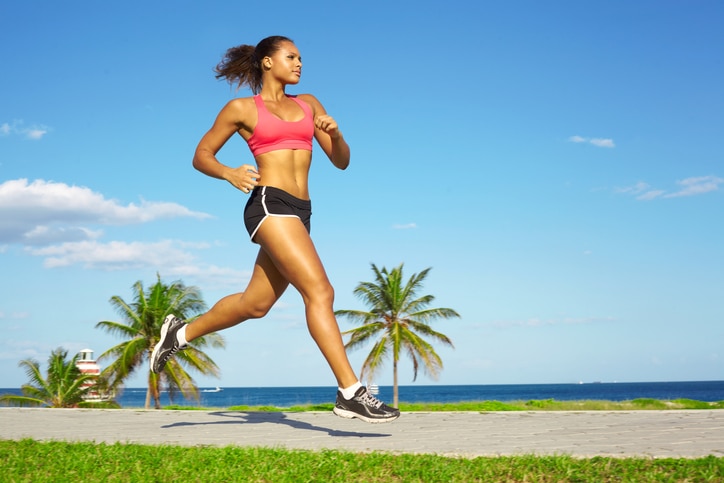 African American woman jogging running