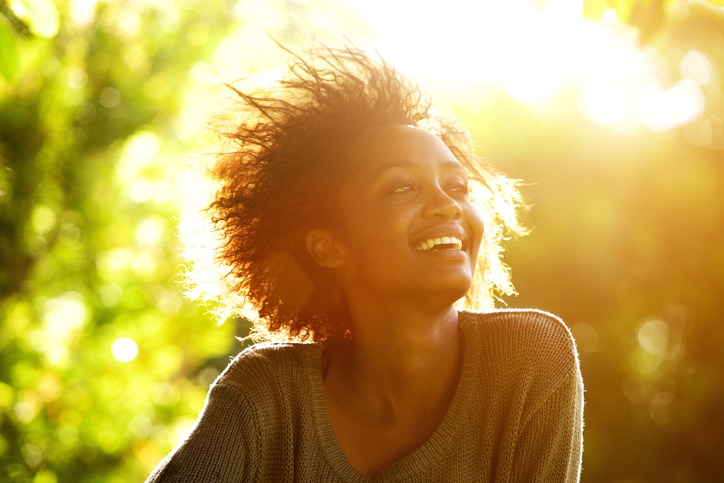 African American woman smiling sun