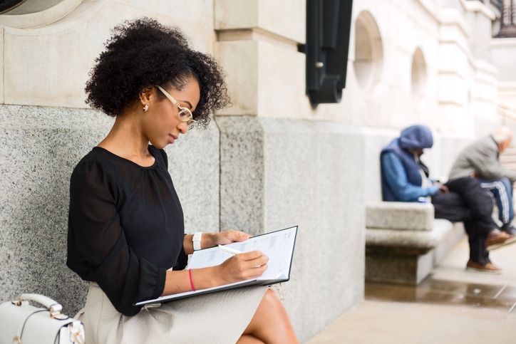 African American woman journaling
