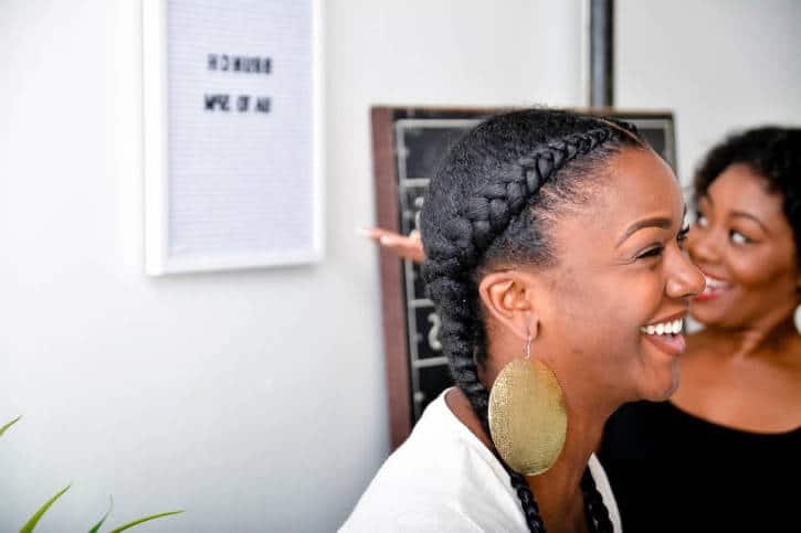 African American young woman happy smiling