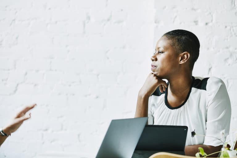 Businesswoman listening to client