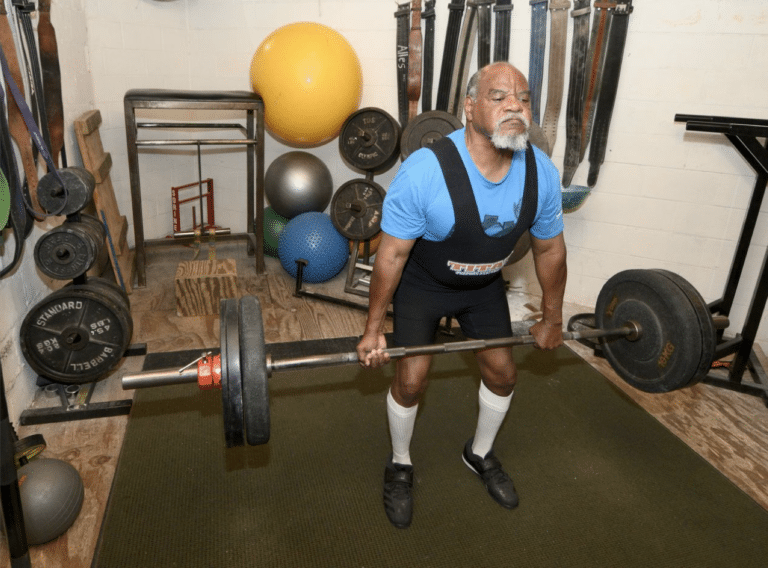 MAN PUSHES PAST CANCER & BLINDNESS TO WEIGHTLIFTING WORLD RECORD