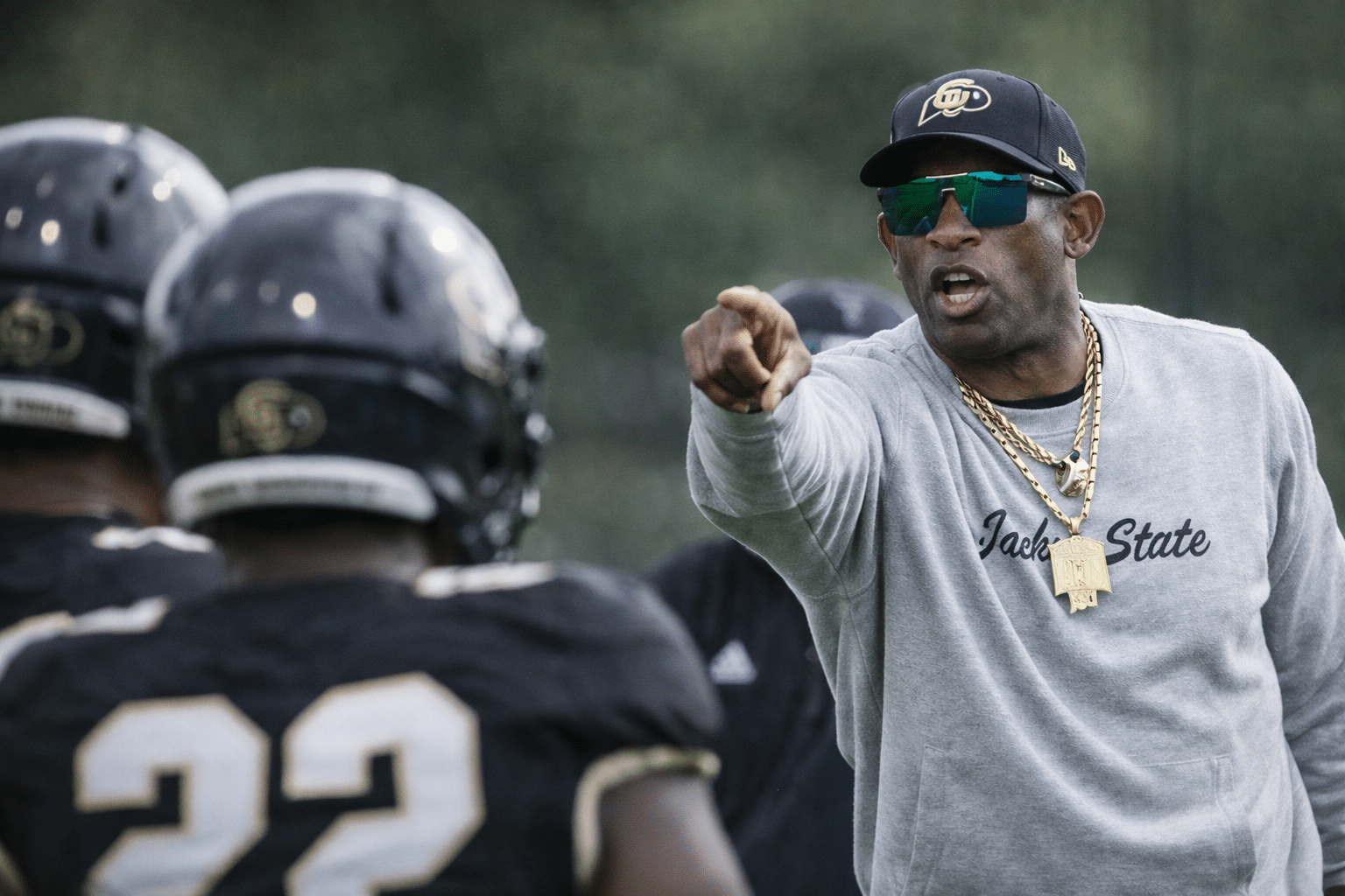 Deion Sanders commanding his team