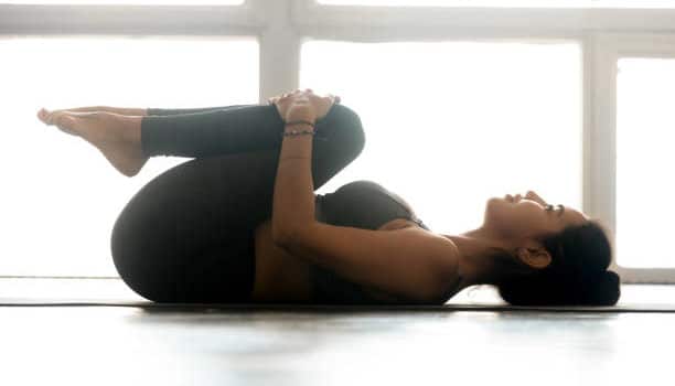 knee to chest lower back stretches