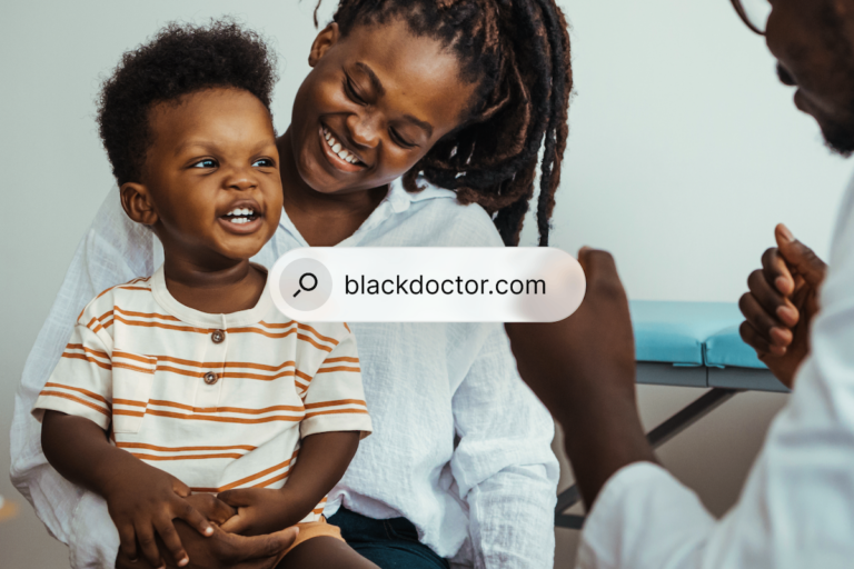 A Black mother and her young Black son smiling at a Black doctor in a clinic. A search bar overlay reads 'blackdoctor.com'.